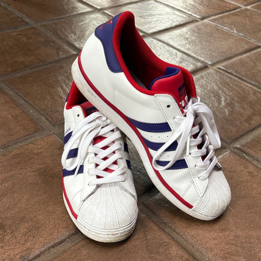 Adidas men’s Superstar purple and scarlet shoes